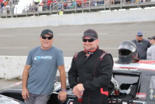 Chris Davidson (right) and his adviser Mike Garvey chat before the last chance race. Davidson won that consi and ran as high as seventh in the main event. (Jim Carson photo)